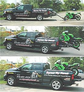 MotoLimo Truck lifting a motorcyle